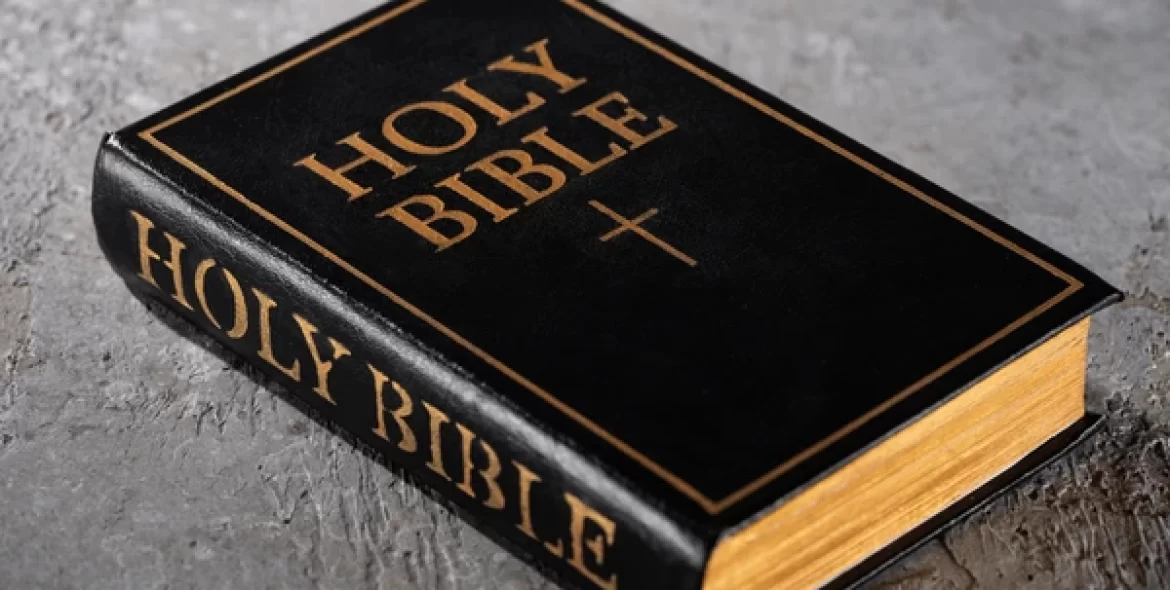 holy-bible-on-grey-textured-600nw-1668924805